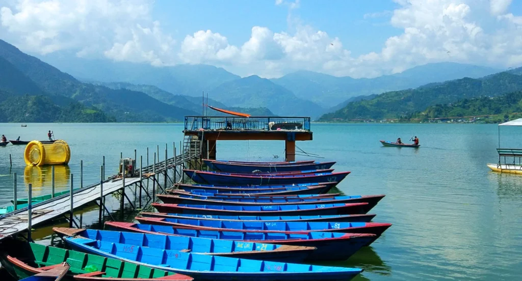 Pokhara adventure activities with paragliding, ziplining, and Phewa Lake views surrounded by mountains